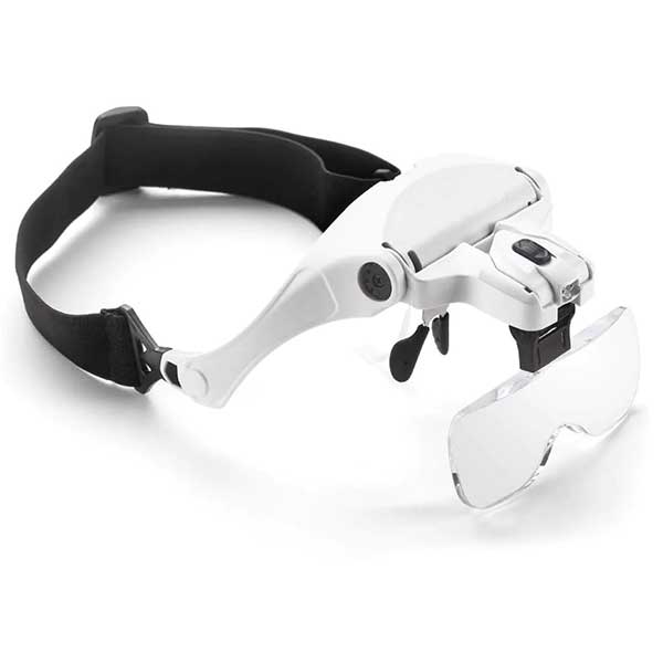 VisionAid magnifying glasses with the headband attached and a lens fitted